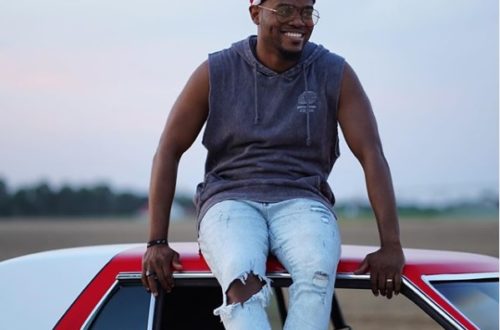 All things New by Travis Greene, Sitting on a red car